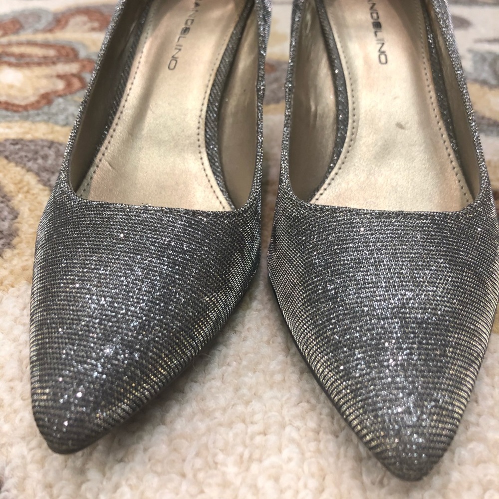 Silver sparkle high heels with black undertone.